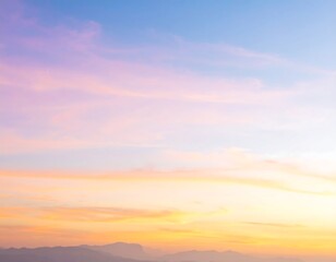 Soft pastel sunset hues paint the sky, merging with hazy mountains on the horizon