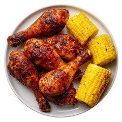 bbq chicken drumsticks and corn on white plate, top view on white background
