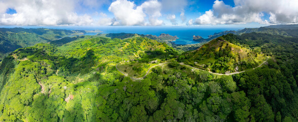 Magnificent aerial view of the bottom of the HANE and HOKATU valleys on the island of UA HUKA in the Marquesas archipelago in French Polynesia