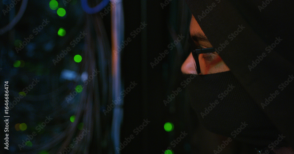 Poster night, hacker and person with mask by cables for scam, phishing or cybercrime for online attack. ano
