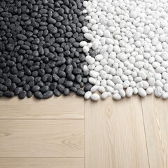 Black and white stones on light wood