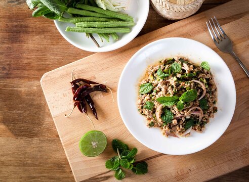 larb Pork Laos food Larb, Spicy minced pork salad