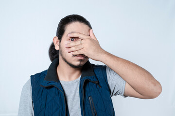 Man suffering from glaucoma on white background. person showing his eye with glaucoma on isolated...