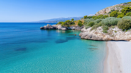Fototapeta premium Crystal clear water meets sandy beach in serene coastal landscape, surrounded by lush greenery