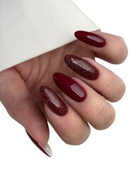 Young Woman’s Hands with Luxurious Professional Manicure Featuring Elegant Nail Art, Glossy...