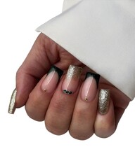 Young Woman’s Hands with Luxurious Professional Manicure Featuring Elegant Nail Art, Glossy...