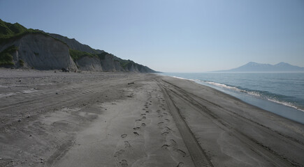 White Cliffs natural wonder on the very long black sand beach