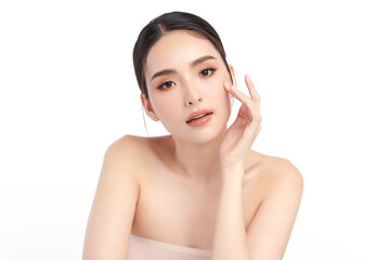 A beautiful young Asian woman with clean, fresh skin against a white background. Skincare, facial...