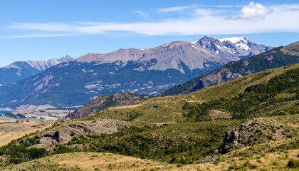 Fototapeta premium Mountain range landscape, lush greenery, snow-capped peaks