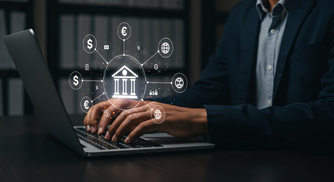 A man in a suit types on a laptop with a bank icon and currency symbols displayed above, representing online banking.