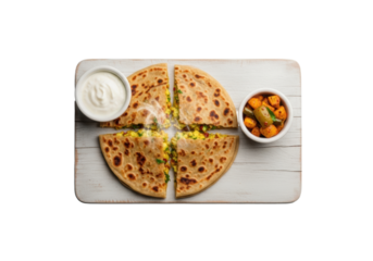 Golden-brown aloo paratha cut in half revealing fluffy, steaming potato filling with herbs, creamy yogurt, vibrant Indian pickle on rustic wood, top-down studio shot. Wholesome North Indian breakfast