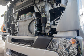 Truck with an open motor compartment
