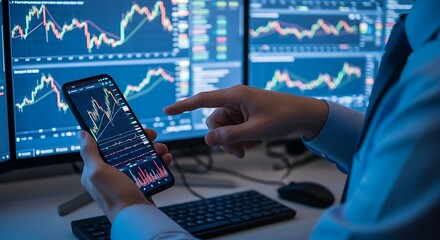 Dynamic stock trader analyzing market data on phone and monitors with real time graphs for financial gain