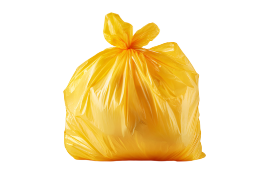Yellow trash bag on black background waste disposal recycling