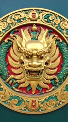 Obraz premium Golden dragon head medallion on green background