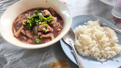 Thai Spicy Beef Soup with Liver and Tendon Served with Steamed Rice