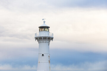 Close-up of the head of Wollongong's Breakwater Lighthouse in the afternoon light.
