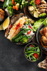 Table scene of various delicious foods. Healthy, family dinner.