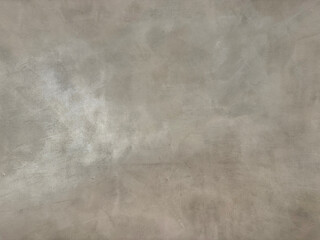 Decorative metallic silver grey paint on a surface. Random limestone golden washed paint with grunge, and dirt pattern. Seamless background texture.