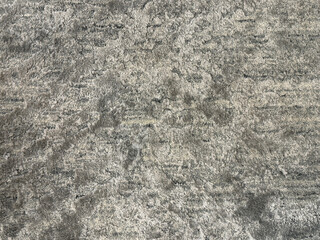 Close up of carpet rug flooring in tuft bump map texture in grey color. Seamless monochrome rug texture, for bump material. Suitable for floor.