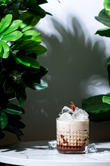 Snickertini, winter alcoholic cocktail drink with chocolate and caramel sauce, vodka, amaretto,...