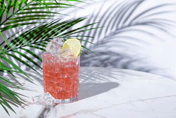 Pink pepper margarita alcoholic cocktail drink with tequila, paprika juice, lime juice, syrup and...