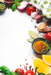 Healthy cooking food background with spices, herbs, turmeric, dried herbs, chili powder and kitchen...