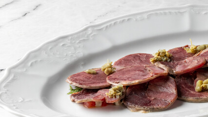 Elegant charcuterie artfully arranged with burst of zesty relish, perfect for Bastille Day feasts or rustic autumn gatherings