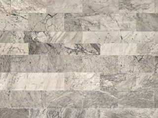 White and grey Italian marble with random dark veins. White carrara and white bianco marble seamless texture. © TMR Studio