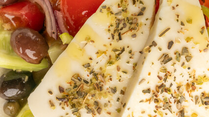 Zesty Mediterranean salad with herbed feta triangles dances in harmony, echoing Greek Easter feasts...