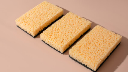 Three orderly sponges mirror a playful ode to spotless spring cleaning and whimsical Bubble Bath Day festivities