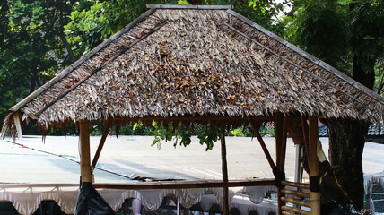 the roof of the house is thatched