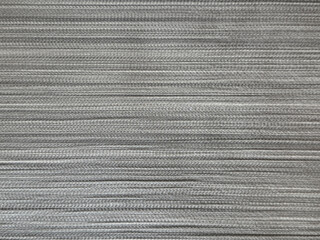 Close up pattern of horizontal stripes with dark grey fabric background. Suitable for fabric and wallpaper. Silk linen woven textile. Seamless background texture.