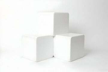Obraz premium Three White Cubes Stacked on White Background for Product Display