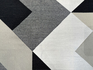 Abstract geometric diagonal hexagonal and triangular pattern. In monochrome black, grey, and whte colors. Suitable for wallpaper, graphic background. Seamless background texture.