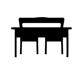 Silhouette of a classic wooden desk with two visible chairs, black and white