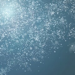 Obraz premium A flurry of white snowflakes and small dots are scattered against a blue gradient background