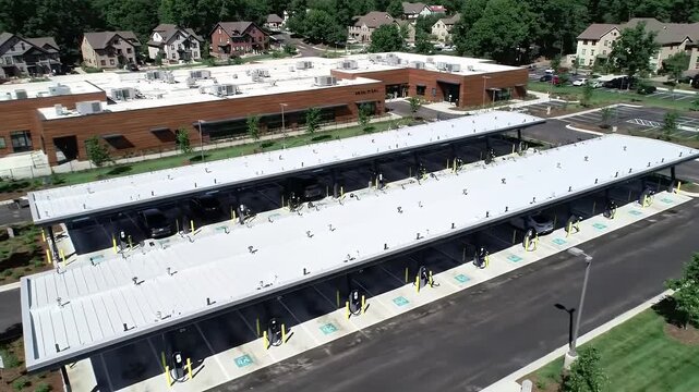 Parking Structures: A modern parking structure featuring long, covered bays and a contemporary design that seamlessly blends practicality with aesthetics.