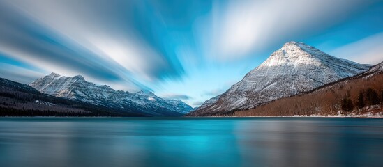 Serene winter mountain lake scene with streaked clouds