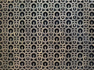 Close up of oxidized and weathered laser cut panel in round circle pattern. Suitable for screens and partition divider. Antique industrial looking. Seamless background texture.