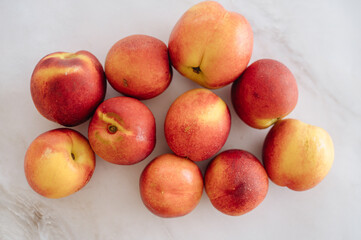 Beautiful ripe nectarine with aromatic skin, top view of fresh summer fruit
