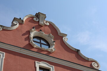Historic building architecture display against a clear blue sky in vibrant colors and intricate...