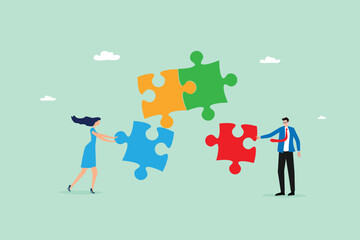 Business Team Collaborating to Connect Colorful Puzzle Pieces - Teamwork and Problem Solving Concept
