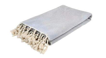 Folded textile displays a woven pattern with tassels on a black background, soft texture