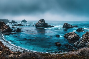 Dramatic coastal scene with turquoise water and rocky outcrops