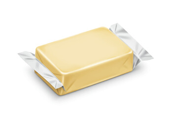 A wrapped rectangular block of butter with foil sticking out from the sides