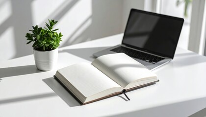 Simple Workspace With Laptop And Notebook On White Desk