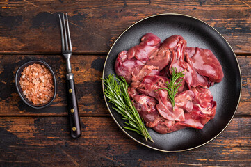 Raw chicken liver, featuring a glossy sheen and rich hue. A versatile ingredient that brings bold...