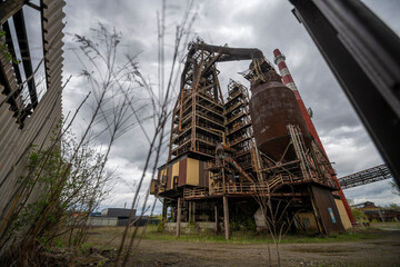 Abandoned Heavy Industrial Ruins with Large Blast Furnace in Steelworks