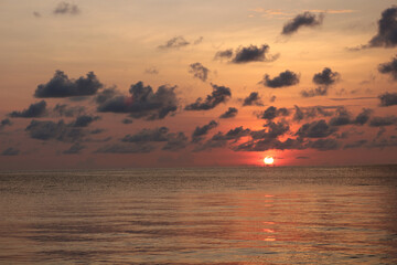 Naklejka premium Sunset Over Calm Ocean
